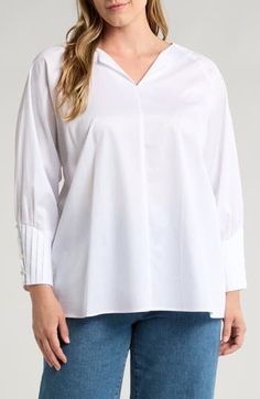 The simple style of this top cut from smooth, refined cotton with pleated sleeves gives it the versatility to easily cross from casual to styled-up looks with ease. 24 1/2" length Split neck Long sleeves with button cuffs 100% cotton Machine wash, dry flat Made in Turkey Pleated Tops For Daywear In Fall, Classic Pleated Tops For Fall, Fall Classic Pleated Tops, Pleated Workwear Top In Solid Color, Classic Pleated Office Tops, Modern Tops With Cuffed Sleeves For Fall, Workwear Blouse With Pleated Sleeves And Relaxed Fit, Pleated Sleeves Blouse For Workwear In Relaxed Fit, Solid Pleated Tops For Workwear