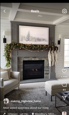 the living room is decorated for christmas with stockings on the mantle and stockings hanging over the fireplace