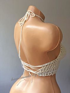 "If you want to see my other handmade bikini and pareos; https://www.etsy.com/shop/yarnisland?ref=seller-platform-mcnav&section_id=28064187 Handmade with 100% high quality cotton yarn. Indispensable for summer fashion and festivals, great crochet top. You can make great combinations with your shorts and jeans. Its material is very strong and is knit frequently for minimal transparency. Color; White SIZING: If you are not sure which size to choose for your size, please choose from the size ch Bohemian Crochet Lace Halter Top For Beach, Handmade Bohemian Crochet Top For Beach Party, Handmade White Halter Top For Vacation, Bohemian Crochet Lace Triangle Halter Top, Handmade Triangle Halter Top For Beachwear, Handmade Triangle Halter Top For Beach, Beachy Handmade Crochet Top For Festival, Handmade White Halter Top For Festival, Handmade Triangle Halter Top For Beach Season