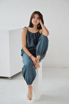 "Ocean wave soft linen trousers with elastic waistband for comfortable fit. Trousers with pockets. Height of my model - 170 cm. / size - S Select size: XS Waist 66 - 68 cm. / (26\" - 26 3/4\") Hips 90 - 92 cm. / (35 1/2\" - 36 1/4\") S Waist 70 - 72 cm. / (27 3/4\" - 28 1/4\") Hips 94 - 96 cm. / (37\" - 37 3/4\") M Waist 74 - 76cm. / (29 1/4\" - 30\") Hips 98 - 100 cm. / (38 1/2\" - 39 1/4\") L Waist 78 - 80 cm. / (30 3/4\" - 31 1/2\") Hips 102 - 104 cm. / (40 1/4\" - 41\") XL Waist 82 - 84 cm. Casual Linen Lounging Pants, Comfortable Linen Harem Pants With Relaxed Fit, Comfortable Relaxed Fit Linen Harem Pants, Spring Linen Lounging Pants, Summer Linen Relaxed Harem Pants, Summer Relaxed Linen Harem Pants, Summer Harem Pants With Elastic Waistband For Lounging, Linen Pants For Lounging, Relaxed Linen Harem Pants For Loungewear