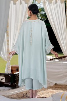 Steel blue asymmetric kaftan with sequin and aari embroidery. Paired with a pant. - Aza Fashions Eid Abaya With Mirror Work, Eid Tunic With Resham Embroidery And Traditional Drape, Eid Dabka Palazzo Set With Tunic, Aari Embroidery, Aari Work, Pants Pattern, Pant Set, Steel Blue, Set For Women