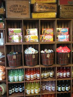 the shelves are filled with many different types of condiments