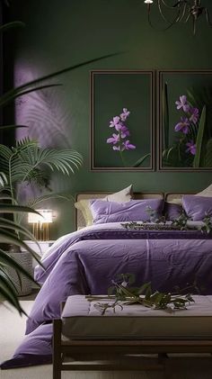 a bedroom with green walls and purple bedspread, plants on the bed side