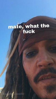 a man with dreadlocks wearing a bandana and looking at the camera, with a caption that reads mate, what the fock