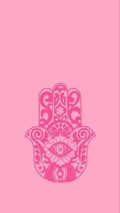 a pink hamsa on a pink background