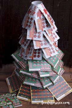 a christmas tree made out of candy bar wrappers