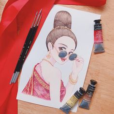 a watercolor painting of a woman with sunglasses and red ribbon next to paint supplies