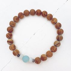 growth // amazonite and wood jasper beaded mala bracelet by Peacock & Lime Earthy Brown Beaded Bracelets For Meditation, Earthy Brown Jasper Beaded Bracelets, Nature-inspired Brown Beaded Bracelets With Natural Stones, Earthy Brown Beaded Bracelets With Gemstone Beads, Quiet The Mind, Jasper Bead Bracelet, Ancient Trees, Mala Beads Bracelet, Reconnect With Nature