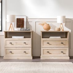 two wooden dressers sitting next to each other on top of a carpeted floor