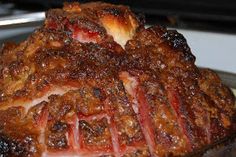 a large piece of meat sitting on top of a pan