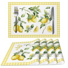 placemats and napkins with lemons on them