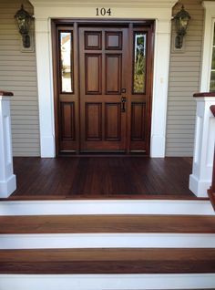 a front door and steps leading to a house