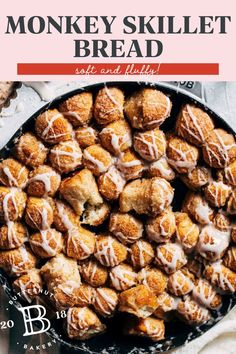 a skillet filled with monkey bread and drizzled with icing on top