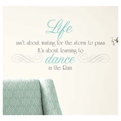 a wall decal that says life isn't about waiting for the storm to pass it's about learning to dance in the rain