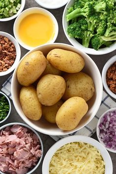 several bowls filled with different types of food on top of a table next to broccoli