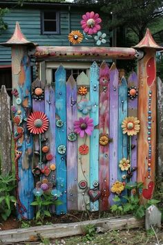 a colorful fence with flowers on it