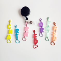 Make a professional statement with a custom handmade resin name badge reel charm. This is the perfect accessory for nurses to display their name and profession with pride while on the job. Carry a piece of yourself with you wherever you go and make a lasting impression on colleagues and patients. It's a functional and stylish way to make sure you're always easily identifiable! - SHIP BY DATE: When your package is ready and leaves my workspace. - DELIVERY DATE: When your package arrives to you. N Personalized Fun Badge Reel For Gift, Personalized Fun Badge Reel Gift, Customizable Red Badge Reel As A Gift, Customizable Multicolor Badge Reel For Gift, Vet Tech School, Nurse Accessories, Nursing Accessories, Phlebotomy, Tech School