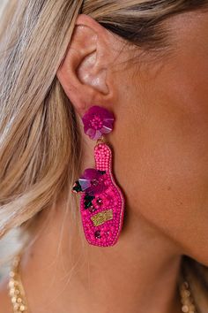 Make a fun statement with our cute fuchsia hued 'Tropical Days' earrings featuring sequin flower studs and a beaded dangling bottle! Sequin Flower, Flower Studs, Beaded Earrings, Crochet Earrings, Sequin, Drop Earrings, Crochet, Quick Saves, Bead Earrings