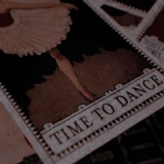 four stamps with the words time to dance printed on them, all in black and white