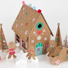 gingerbread house made out of cardboard with decorations