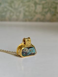 Australian Boulder Opal full of fire and color, wrapped in an ancient granulation stylized 22k Gold bezel with wide bail. 5/8" x 1/2". 14k chain. A unique addition to my "Ancient Illusion" Opal and 22k Gold pendant collection. 22k Gold Necklace, Weird Jewelry, Australian Boulder Opal, Cabochon Pendant, Brass Jewelry, Boulder Opal, Jewelry Inspo, Opal Jewelry, 22k Gold