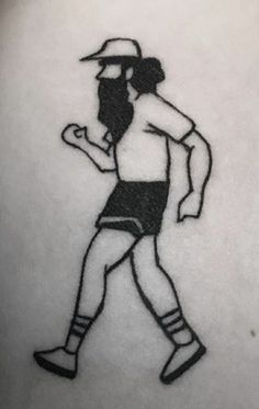 a drawing of a man wearing shorts and a hat is on the back of a woman's stomach