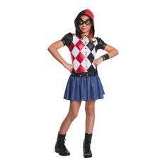 a girl in a costume is standing with her hands on her hips