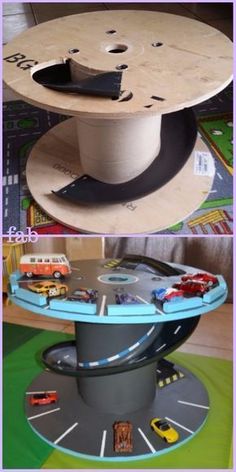 the table is made out of cardboard and has cars on it