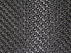 an image of a black and white checkerboard textured wallpaper with circles