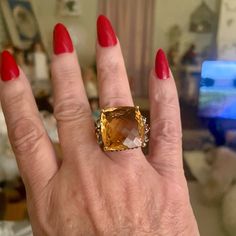 This Is A Beautiful Authentic Citrine Ring. Size 8 1/2. The Beautiful Center Stone Is A Magnificent 37ct Citrine Thst Is Surrounded By Smaller Amethyst And Peridot. It Is Fashioned In Sterling Silver. This Is A Gorgeous Statement Ring. It Is Heirloom Quality Luxury Yellow Gemstones With Accent Stones, Luxury Yellow Citrine Gemstones, Luxury Gold Diamond Gemstones, Elegant Gold Gemstones With Accent Stones, Elegant Yellow Gemstones For Wedding, Luxury Gold Gemstones For Wedding, Elegant Formal Topaz Ring With 17 Jewels, Luxury White Gold Citrine Ring, Gold Diamond Gemstones With Accent Stones