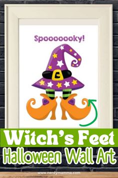 a witch's feet halloween wall art with the words spooky on it