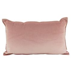 a pink velvet pillow on a white background