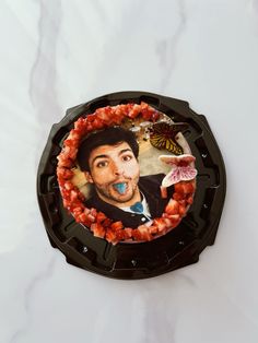 a cake with a man's face on it