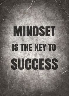 a black and white photo with the words mindset is the key to success