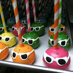 there are many colorful donuts with sunglasses on them