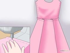 a pink dress being sewn on to a mannequin with a sewing machine