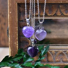 This necklace is made from an amethyst stone which has been cut into a puffy heart. The stone hangs from a silver plated chain. You can choose the length of the necklace you prefer. You will get a necklace at random. Please note that all necklaces are handmade and may differ from the pictured. The picture shows multiple necklaces. You will receive one necklace with one pendant. Ewelina Pas Jewelry Gemstone Choker Necklace, Heart Necklace Silver, February Birthstone Necklace, Amethyst Heart, Gemstone Choker, Sterling Silver Heart Pendant, Necklace Layering, Silver Heart Pendant, Puffy Heart