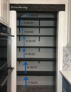 an open pantry door with the measurements for kitchen cabinets and drawers labeled in blue arrows