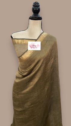 Pure tissue banaras saree with blouse piece fall & pico done Celebration Tussar Silk Blouse With Dupatta, Gold Pre-draped Saree With Dupatta In Cotton Silk, Unstitched Cotton Silk Saree For Celebration, Tissue Silk Dupatta With Self Design, Slub Silk Unstitched Suit With Traditional Drape For Celebrations, Celebration Cotton Silk Unstitched Saree Suit, Gold Bollywood Style Unstitched Slub Silk Suit, Unstitched Cotton Silk Suit For Celebrations, Gold Unstitched Cotton Silk Suit With Zari Work