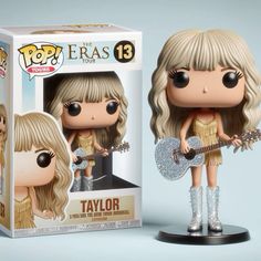 a pop vinyl figurine is shown in front of a box with an image of taylor