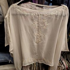 New York And Company White Sheer Poncho, One Size. Can Be Dressed Up Or Down. Has Designer Stitching And Sequence Along The Edges. Casual Free Size Top With Batwing Sleeves, Casual Free Size Batwing Sleeve Tops, White Batwing Sleeve Blouse For Summer, Beige One Size Batwing Sleeve Tops, One Size Beige Batwing Sleeve Top, Spring Cream One Size Tops, White One Size Tops For Vacation, Beige One Size Tops For Vacation, Beige One Size Top For Vacation