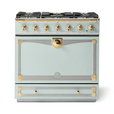 an oven with two burners and gold trimmings on the front, against a white background