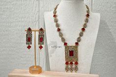 *This beautiful NADIA style includes a long necklace (mala/rani haar) and earrings in MAROON.  *Measurements/Attributes: -Long necklace (mala/rani haar): 27 cm long (pendant itself is 4 cm by 9 cm long) -Earrings: 6 cm by 1.5 cm *Includes gift box? NO *Ready to ship? YES *Additional colors? NO *Customizable? NO (check our shop for other customizable jewelry) *This product is handcrafted therefore, minor imperfections may be present. *QUESTIONS? GROUP/BRIDESMAID ORDERS? FIRST TIME BUYING DESI/SOU Red Temple Necklace With Latkans For Wedding, Red Wedding Jewelry Sets With Latkans, Red Temple Necklace With Zari Work For Wedding, Wedding Necklaces With Latkans For Eid, Red Temple Necklace For Wedding And Festive Occasions, Red Cutdana Jewelry Sets For Wedding, South Asian Jewelry, Nikkah Wedding, Wedding Bollywood