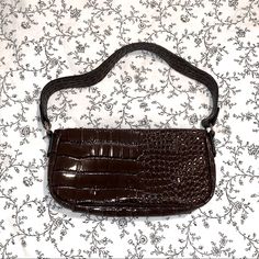 Dark Chocolate, Crocodile-Skin, Textured Shoulder Bag; Shiny Patent Vegan / Faux-Leather; Straps Attached Via O-Rings + Studs To Reinforced Loops On Sides Of Bag; Gold Hardware; Lined Black Interior Brand New Without Tagsthis Was Purchased Online So It Came In Its Own Little Bag, But Without A Tag; No Flaws ~ Flat Measurements - Width: 11" - Length: 5" - Total Strap Length: 20.75" Comment With Any Questions! Chic Leather Baguette Bag With Crocodile Pattern, Leather Baguette Bag With Crocodile Pattern For Everyday Use, Leather Baguette Bag With Crocodile Pattern, Brown Crocodile Pattern Evening Shoulder Bag, Evening Brown Crocodile Pattern Shoulder Bag, Louis Vuitton Bumbag, Louis Vuitton Felicie Pochette, Saddle Handbags, Colorful Tote Bags