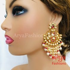 Anaira Red Pacchi Kundan Chandbali with Pearl Beads Premium Quality Kundan Chandbali Earrings Length: Approx. 3.5" Light-weight Push-Back closure with back clip for extra support Gold Finish on high-quality brass as the base metal, Kundan stones and Pearls Suitable for any traditional for contemporary attire and occasion In-stock & ready-to-ship **Color may vary slightly due to photography and lighting. Kundan Chandbali, Chandbali Earrings, Red Bead, Base Metal, Pearl Beads, Gold Finish, Premium Quality, Brass, Beads