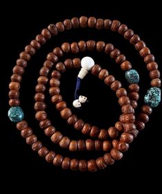 This Nepali Bodhi seed mala with 3 beautiful, vintage, undyed Tibetan turquoise stone bead is strung with vintage 11.5 beads that are cut at the ends so the entire mala less lengthy and more manageable than uncut, spherical beads.  The natural undyed turquoise beads measure approx 18mm, 20mm and 21mm and are at the 21st, 25th, and center places . The guru bead is vintage yak bone. Bodhi seed  is  the most precious for a Buddhist practitione as the natural eye represents the enlightened mind. These seeds are vintage single phoenix eye, they measure 11.5mm at the widest and are cut to 10mm. These Turquoise beads are very special. Bodhi seeds under 12mm are a rare  find. I string all of my malas with intention and each is unique. 🙏 Please contact me if you have any problems with your order. Hand-strung Bohemian Mala For Festivals, Bohemian Wooden Beads Mala For Festival, Bohemian Hand-strung Mala For Festivals, Traditional Mala With Natural Stones For Meditation, Bohemian Festival Mala With Wooden Beads, Festival Mala With Round Gemstone Beads, Bohemian Brown Mala For Rituals, Traditional Mala With Gemstone Beads For Healing, Spiritual Turquoise Beaded Necklace With 108 Beads