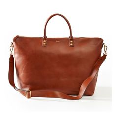 a brown leather handbag on a white background