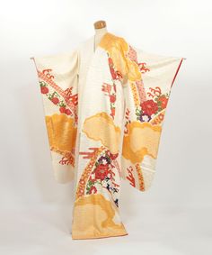 This vintage furisode is an exquisite work of art, made from 100% silk.  It features a striking shibori (tie-dye) technique, with intricate kanoko shibori (fawn dot pattern) inside cloud-like designs, creating a sense of depth and texture.  Adding to its elegance, the kimono is adorned with a beautifully dyed noshi pattern and delicate floral embroidery.  The noshi is a traditional motif representing long strips of folded paper or cloth, symbolizing good fortune, longevity, and a wish for happiness--often associated with celebratory occasions in Japan. Though there is a small stain on the front, as shown in the photos, it is minor and does not take away from the overall beauty of the piece.  This furisode can be worn, or it can be repurposed as a unique material for crafting or as a decora Cloud Pattern Kimono, White Bohemian Silk Kimono, White Silk Bohemian Kimono, Vintage Floral Print Kimono For Wedding, Multicolor Spring Wedding Kimono, White Long Silk Kimono, Ceremonial Vintage Kimono, Vintage Long Kimono For Wedding, White Long Vintage Kimono