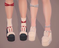 three pairs of shoes with bunnies on the toes and feet, all in different colors