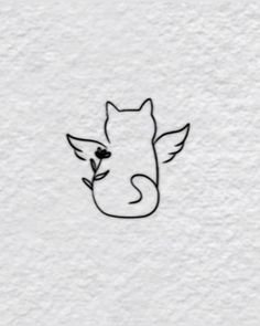 a black and white drawing of a cat's head with leaves on its nose